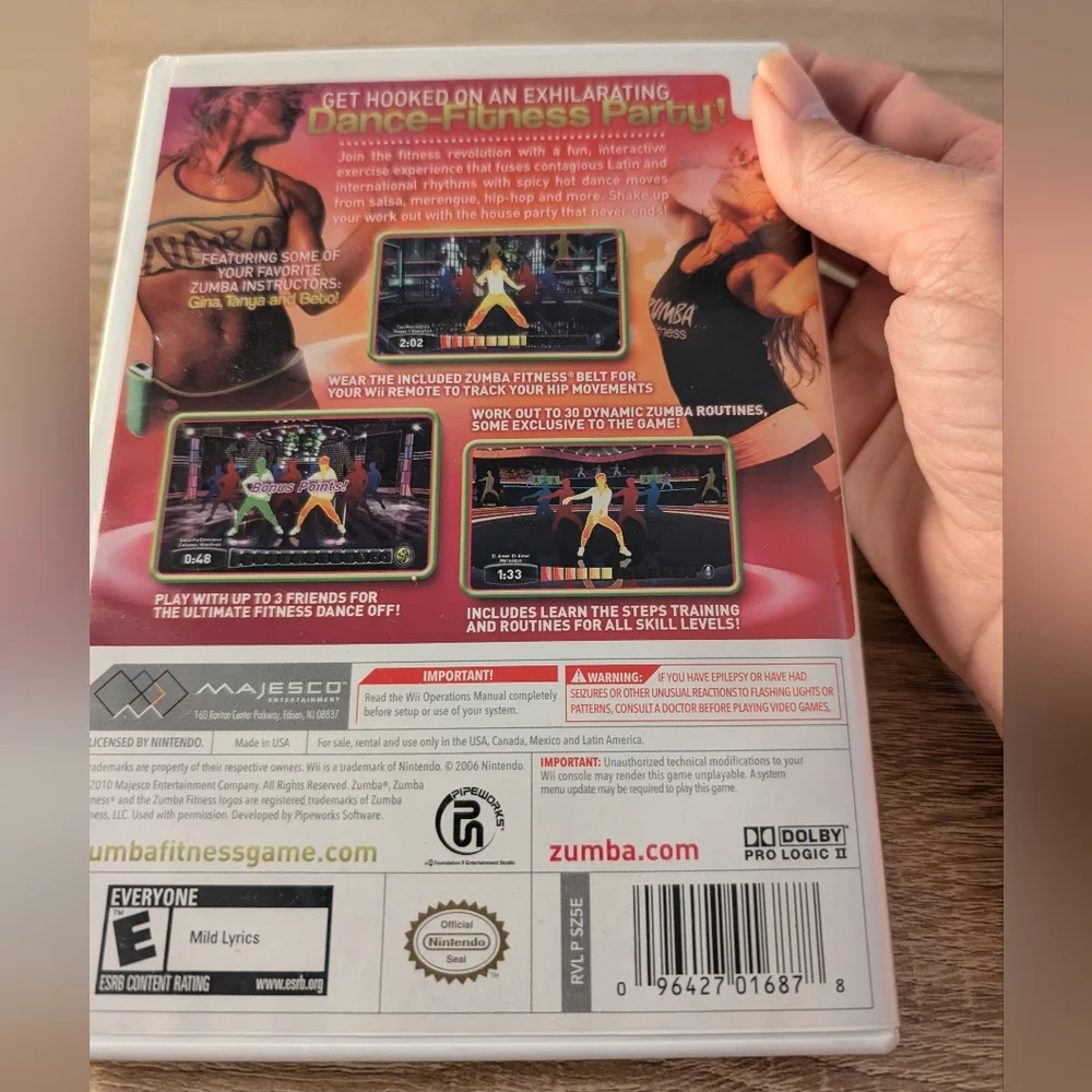 Nintendo Wii Zumba Fitness game with booklet